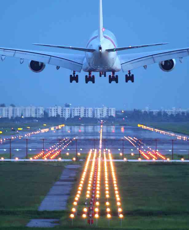 Aeroplane landing on runway)