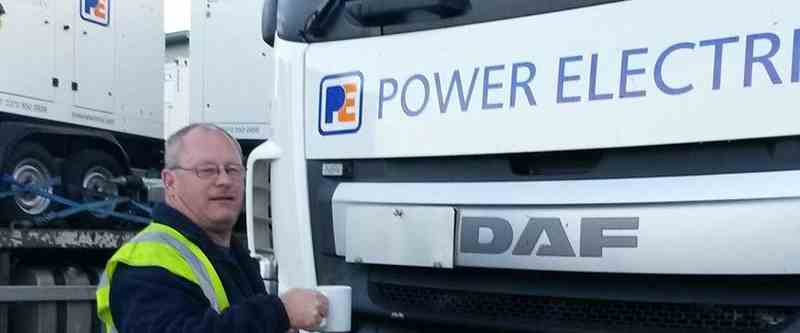 Dave the driver in front of a lorry