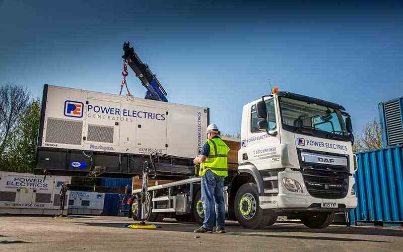 500kVA generator being loaded onto a lorry